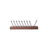 Migration Menorah: Walnut + Stainless Steel