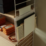 String System: Magazine Holder