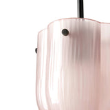 Close-up of a pale pink frosted glass pendant with a scalloped rim, black rod and small dark knobs