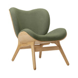 A Conversation Piece Lounge Chair: Oak + Morning Meadows