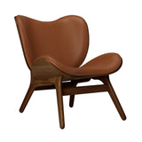 A Conversation Piece Lounge Chair: Dark Oak + Cognac