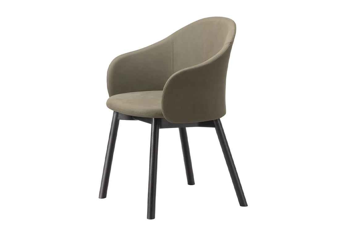 Grey upholstered chair on black wood legs
