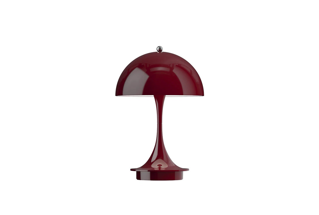 Red table lamp on a white background