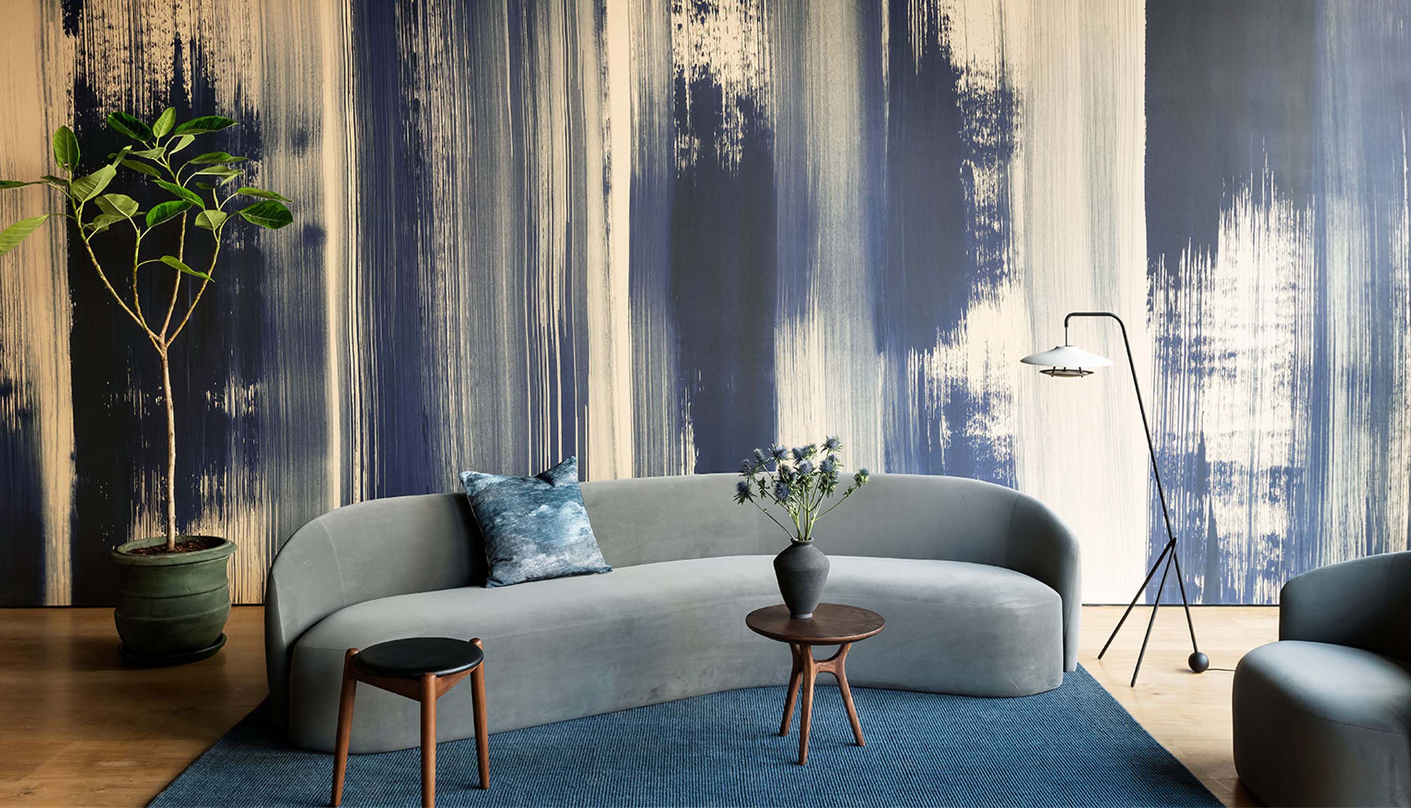 Curved couch and floor lamp from Stellar Works