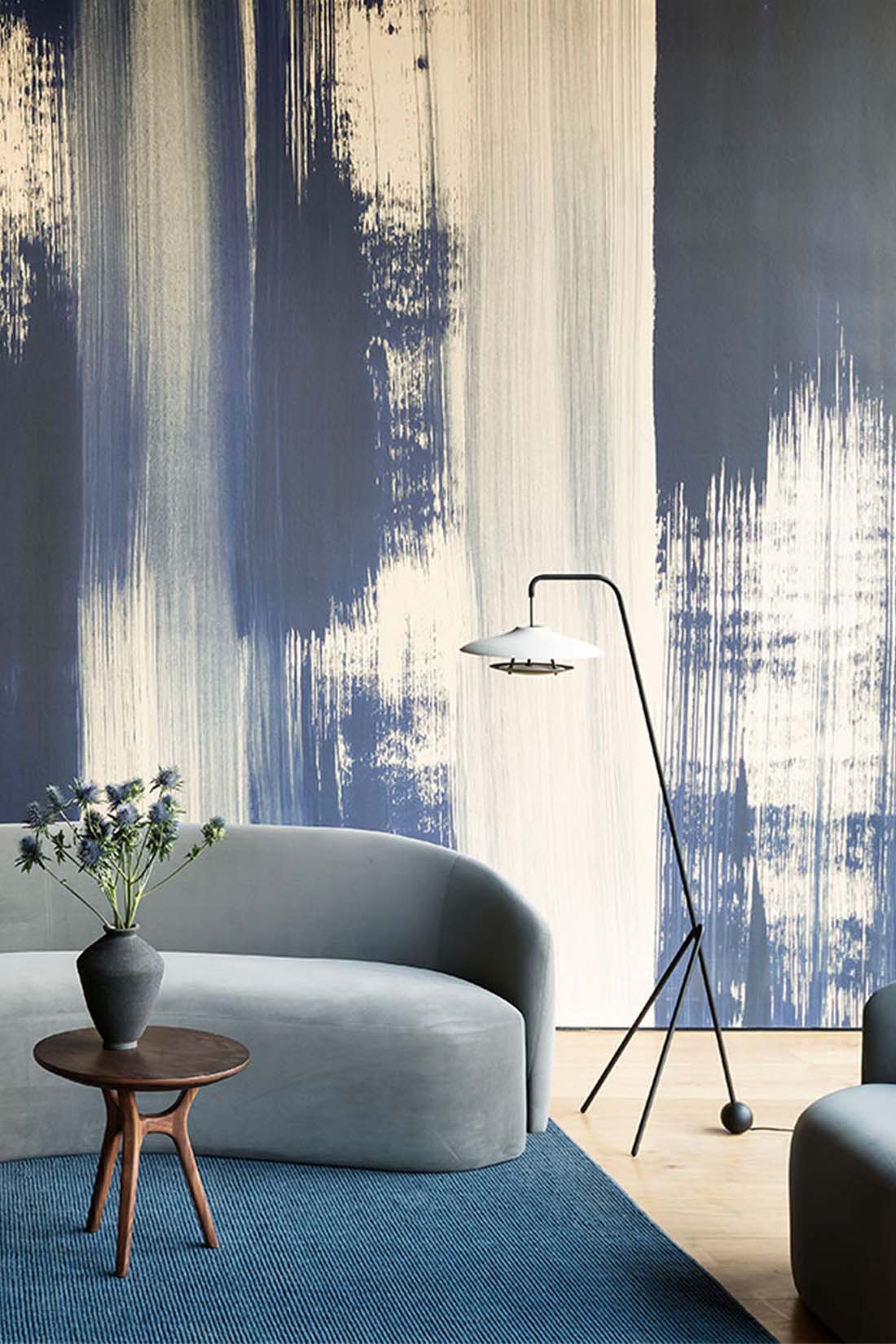 Curved couch and floor lamp from Stellar Works