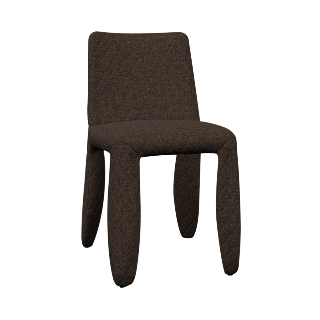 A dark brown dining chair fully upholstered in quilted diamond-stitched fabric with thick rounded legs